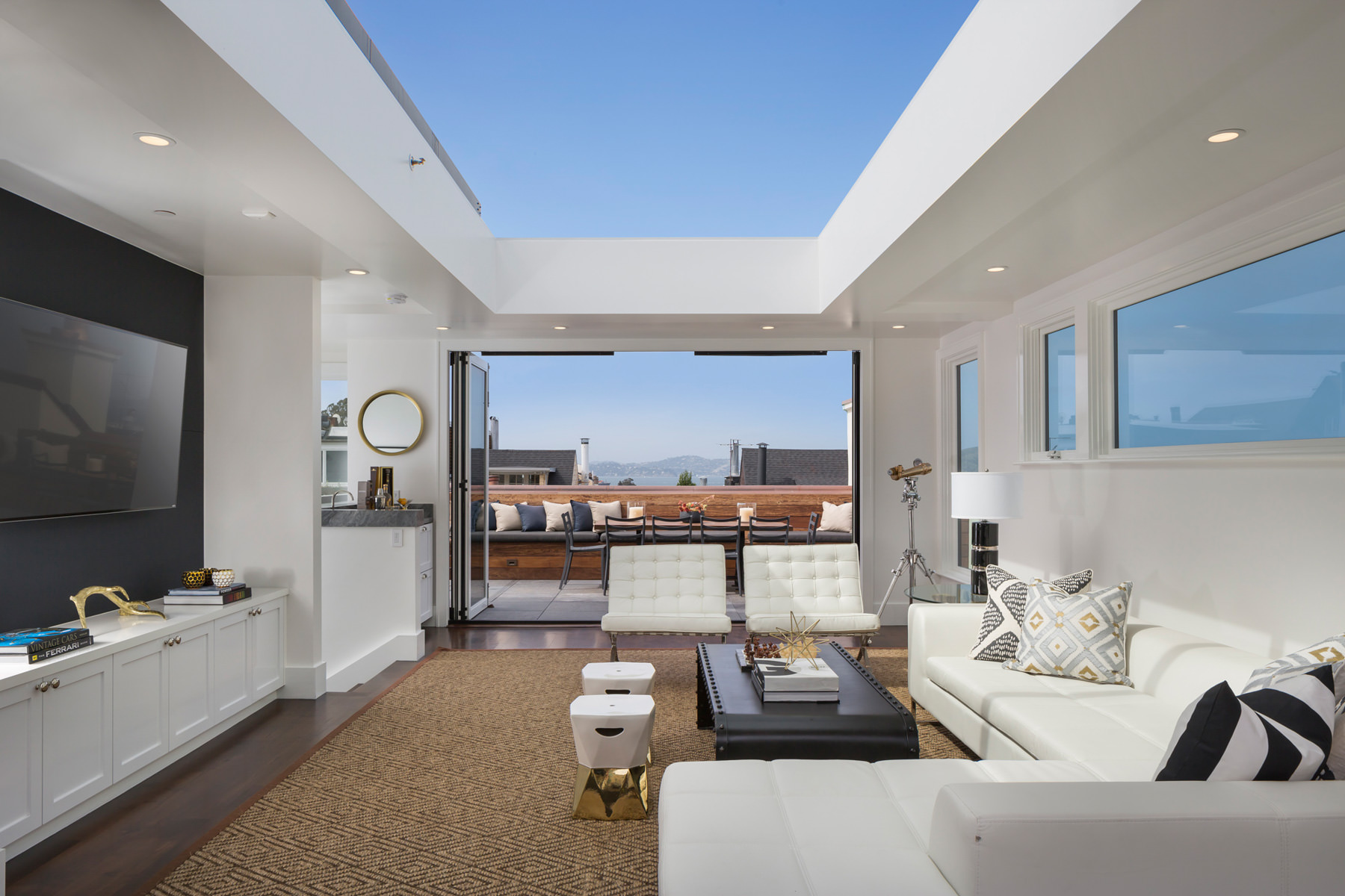 Rooftop lounge with a retractable glass ceiling in San Francisco, CA.